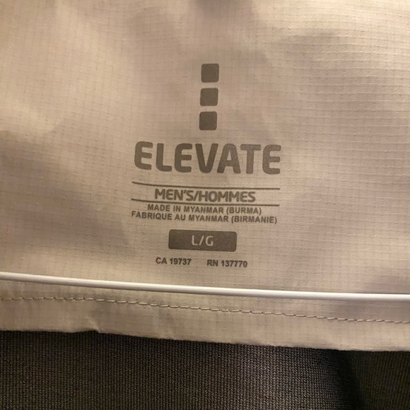 Rain jacket windbreaker in a light tan color NWT - Picture 3 of 3